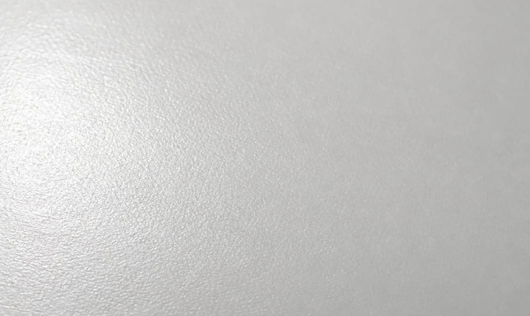 The fine texture of luster photo paper, close up
